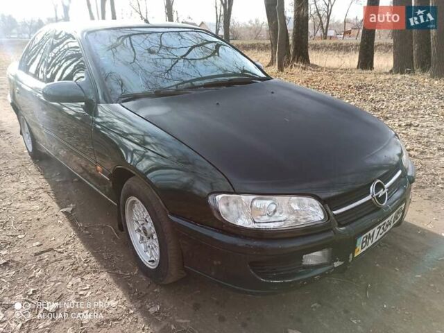 Зеленый Опель Омега, объемом двигателя 2 л и пробегом 615 тыс. км за 1399 $, фото 1 на Automoto.ua