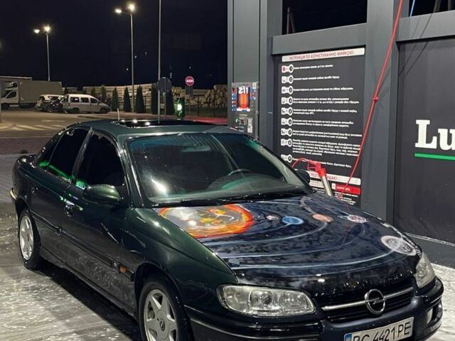 Зелений Опель Омега, об'ємом двигуна 2 л та пробігом 350 тис. км за 1499 $, фото 1 на Automoto.ua