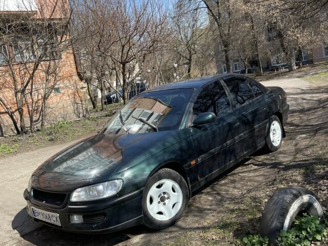 Зеленый Опель Омега, объемом двигателя 3 л и пробегом 290 тыс. км за 2500 $, фото 1 на Automoto.ua