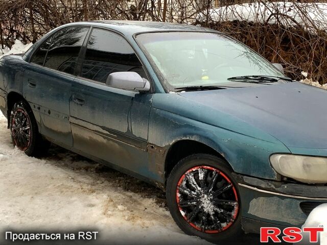 Зеленый Опель Омега, объемом двигателя 2 л и пробегом 400 тыс. км за 1300 $, фото 1 на Automoto.ua