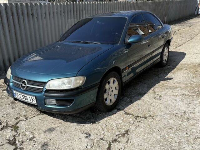 Зеленый Опель Омега, объемом двигателя 3 л и пробегом 394 тыс. км за 3000 $, фото 1 на Automoto.ua