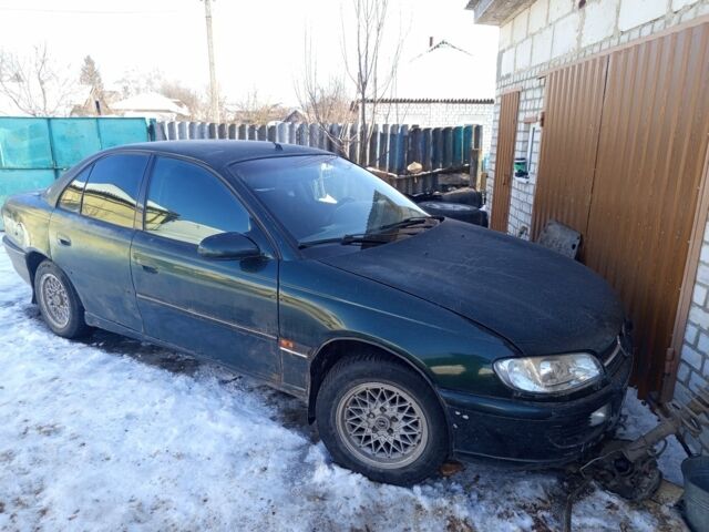 Зелений Опель Омега, об'ємом двигуна 2 л та пробігом 1 тис. км за 565 $, фото 1 на Automoto.ua