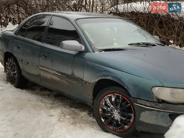 Зелений Опель Омега, об'ємом двигуна 2 л та пробігом 400 тис. км за 1300 $, фото 1 на Automoto.ua