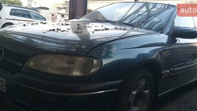 Зеленый Опель Омега, объемом двигателя 3 л и пробегом 350 тыс. км за 1800 $, фото 1 на Automoto.ua
