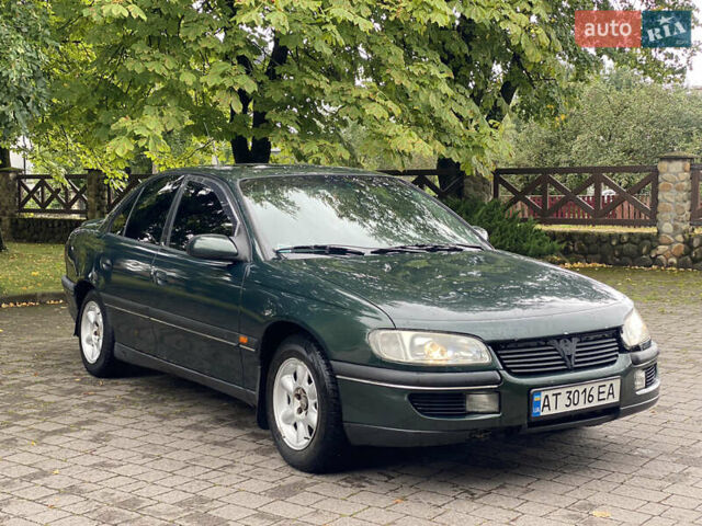 Зеленый Опель Омега, объемом двигателя 2 л и пробегом 300 тыс. км за 1750 $, фото 1 на Automoto.ua