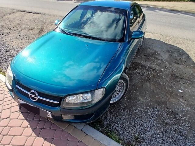 Зеленый Опель Омега, объемом двигателя 2 л и пробегом 500 тыс. км за 2100 $, фото 1 на Automoto.ua