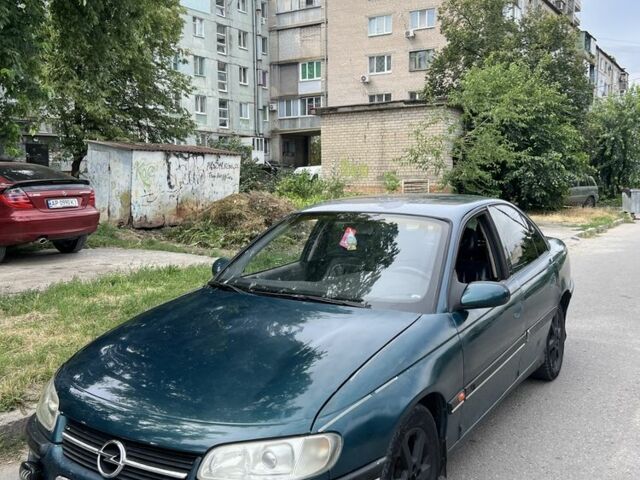 Зелений Опель Омега, об'ємом двигуна 2 л та пробігом 550 тис. км за 1300 $, фото 1 на Automoto.ua