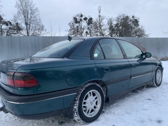 Зелений Опель Омега, об'ємом двигуна 2 л та пробігом 300 тис. км за 2450 $, фото 1 на Automoto.ua