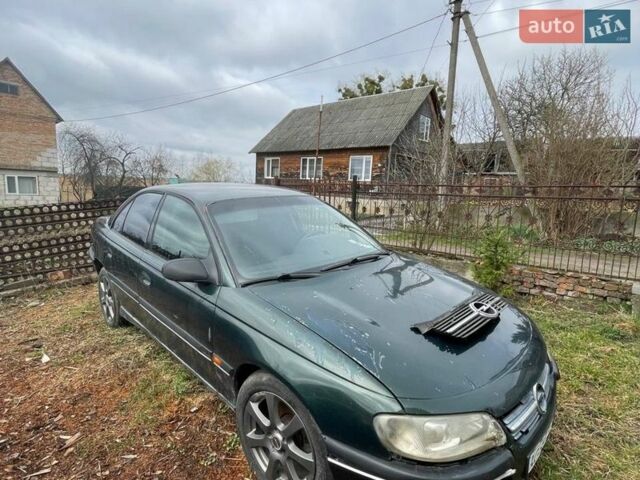 Зеленый Опель Омега, объемом двигателя 2 л и пробегом 200 тыс. км за 850 $, фото 1 на Automoto.ua
