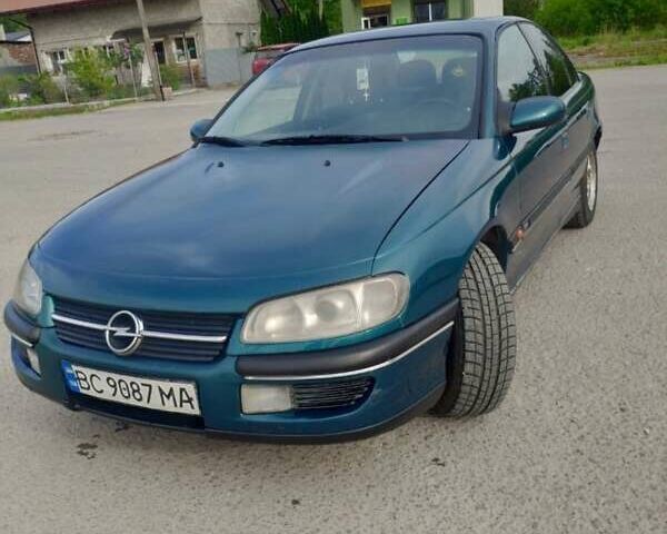 Зеленый Опель Омега, объемом двигателя 2 л и пробегом 290 тыс. км за 1749 $, фото 1 на Automoto.ua