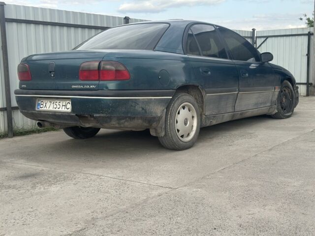Зеленый Опель Омега, объемом двигателя 2 л и пробегом 240 тыс. км за 700 $, фото 1 на Automoto.ua