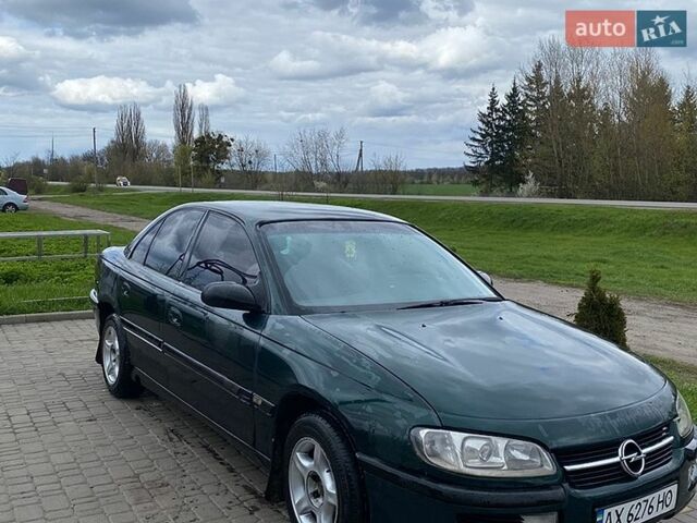 Зеленый Опель Омега, объемом двигателя 2 л и пробегом 150 тыс. км за 1095 $, фото 1 на Automoto.ua