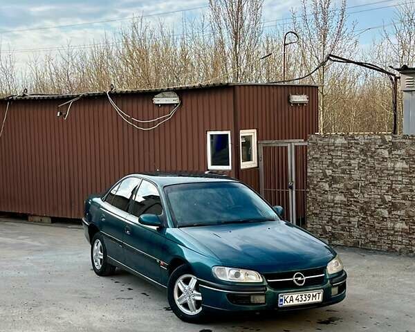 Зеленый Опель Омега, объемом двигателя 2 л и пробегом 331 тыс. км за 2400 $, фото 1 на Automoto.ua