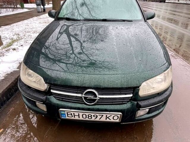 Зеленый Опель Омега, объемом двигателя 2.5 л и пробегом 588 тыс. км за 2500 $, фото 1 на Automoto.ua