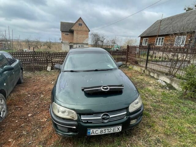 Зелений Опель Омега, об'ємом двигуна 2 л та пробігом 200 тис. км за 850 $, фото 1 на Automoto.ua