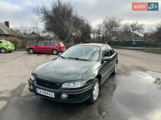 Зеленый Опель Омега, объемом двигателя 2.96 л и пробегом 345 тыс. км за 3000 $, фото 1 на Automoto.ua