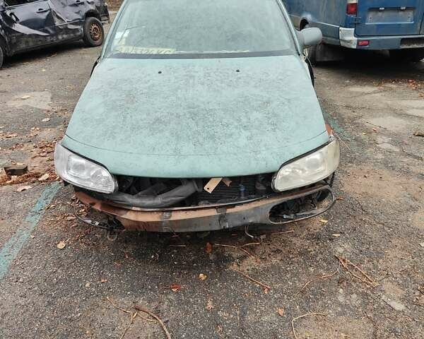 Зеленый Опель Омега, объемом двигателя 1.98 л и пробегом 350 тыс. км за 500 $, фото 1 на Automoto.ua