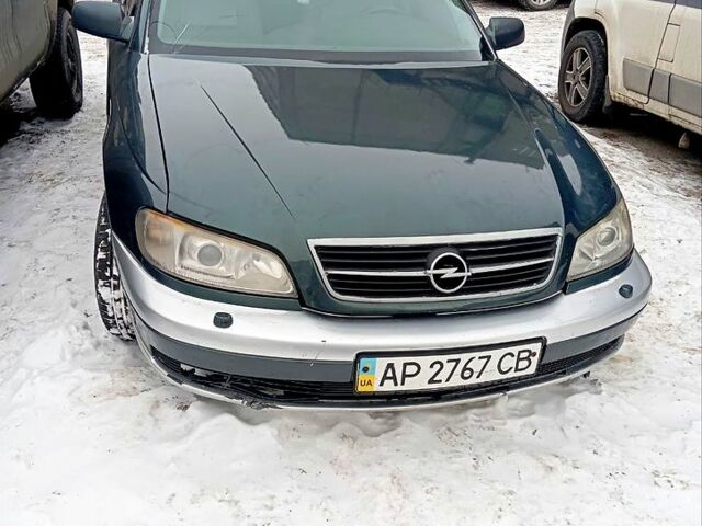 Зеленый Опель Омега, объемом двигателя 2.5 л и пробегом 290 тыс. км за 2000 $, фото 1 на Automoto.ua