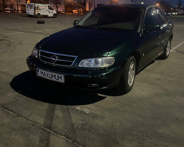 Зеленый Опель Омега, объемом двигателя 2.5 л и пробегом 464 тыс. км за 4300 $, фото 1 на Automoto.ua