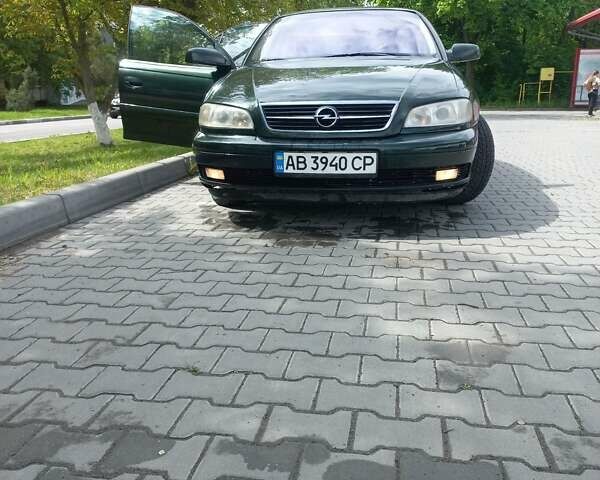 Зеленый Опель Омега, объемом двигателя 2.5 л и пробегом 299 тыс. км за 3000 $, фото 1 на Automoto.ua