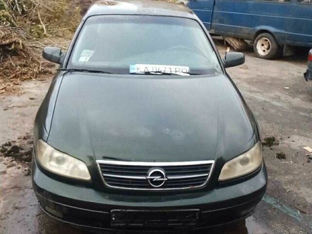 Зеленый Опель Омега, объемом двигателя 2 л и пробегом 350 тыс. км за 1200 $, фото 1 на Automoto.ua