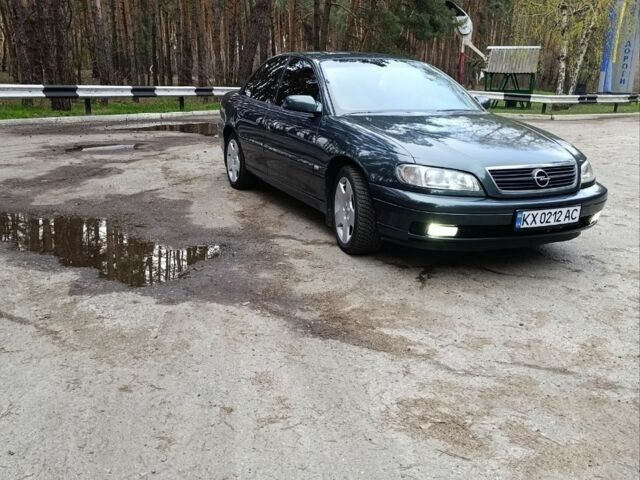 Зеленый Опель Омега, объемом двигателя 2.6 л и пробегом 298 тыс. км за 3303 $, фото 1 на Automoto.ua