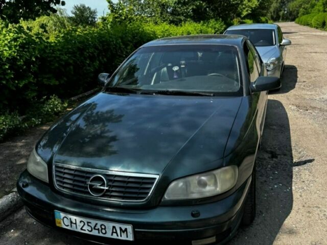Зелений Опель Омега, об'ємом двигуна 2 л та пробігом 250 тис. км за 1792 $, фото 1 на Automoto.ua