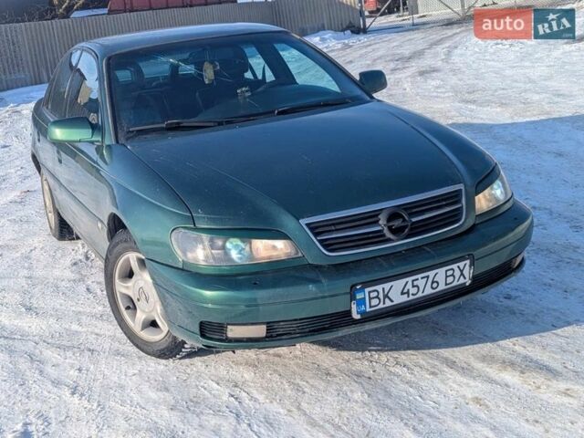 Зеленый Опель Омега, объемом двигателя 2.2 л и пробегом 355 тыс. км за 1550 $, фото 1 на Automoto.ua
