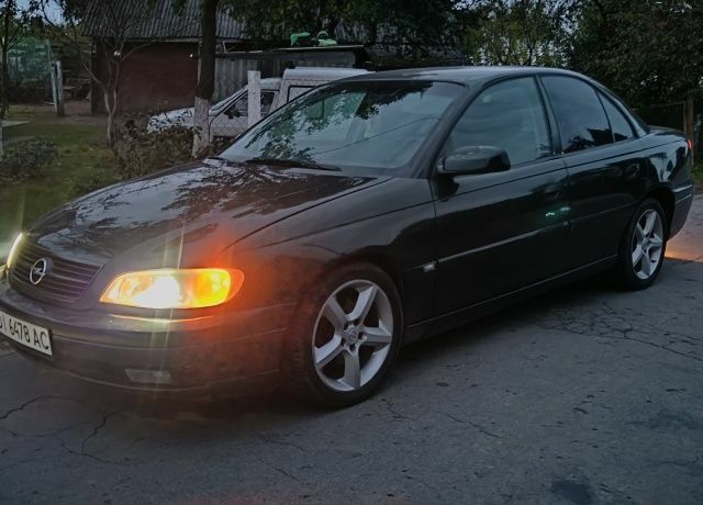 Зеленый Опель Омега, объемом двигателя 2.2 л и пробегом 400 тыс. км за 1800 $, фото 1 на Automoto.ua