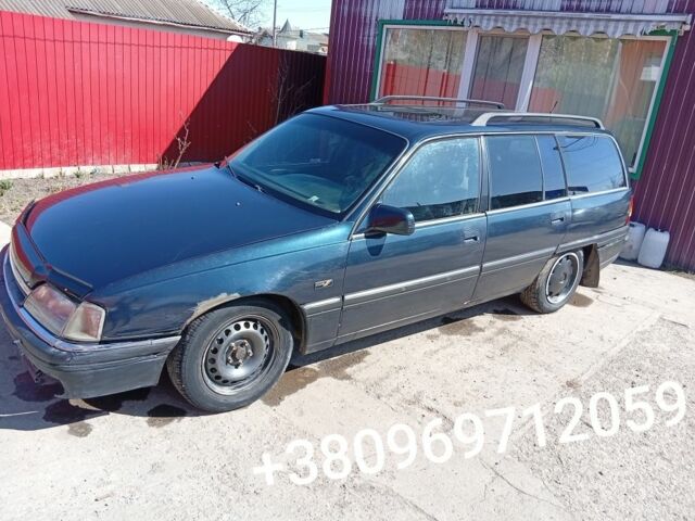 Зеленый Опель Омега, объемом двигателя 2.6 л и пробегом 300 тыс. км за 1500 $, фото 1 на Automoto.ua