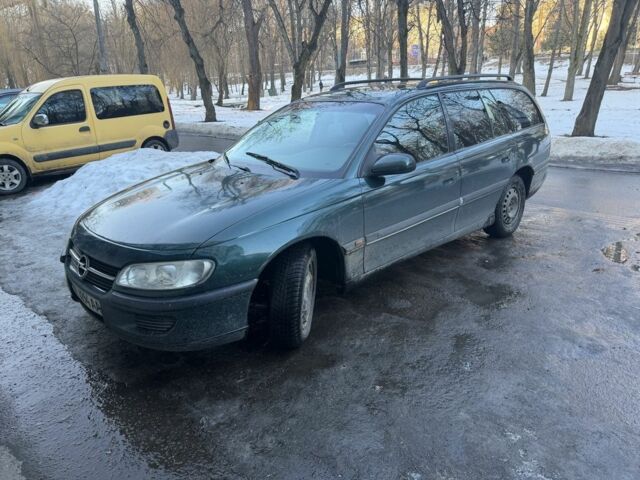 Зеленый Опель Омега, объемом двигателя 2 л и пробегом 350 тыс. км за 1800 $, фото 1 на Automoto.ua