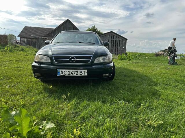 Зеленый Опель Омега, объемом двигателя 2 л и пробегом 320 тыс. км за 1500 $, фото 1 на Automoto.ua