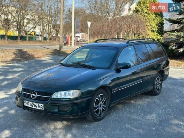 Зеленый Опель Омега, объемом двигателя 2 л и пробегом 200 тыс. км за 1650 $, фото 1 на Automoto.ua