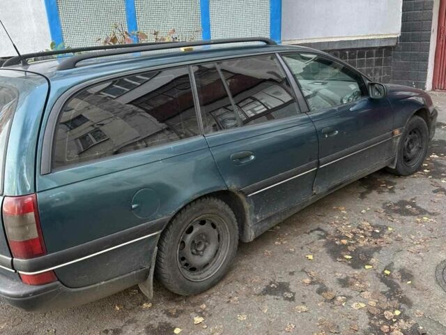 Зелений Опель Омега, об'ємом двигуна 2 л та пробігом 157 тис. км за 1301 $, фото 1 на Automoto.ua