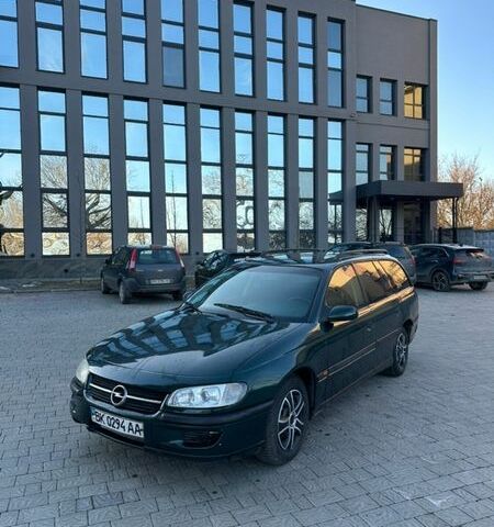 Зеленый Опель Омега, объемом двигателя 2 л и пробегом 250 тыс. км за 1750 $, фото 1 на Automoto.ua