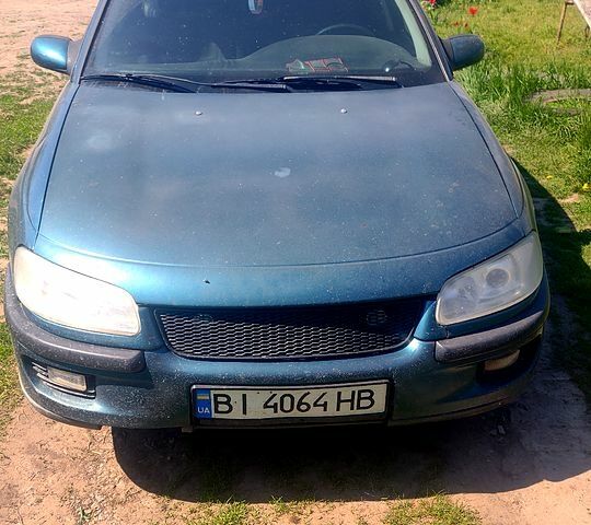 Зеленый Опель Омега, объемом двигателя 2 л и пробегом 120 тыс. км за 2300 $, фото 1 на Automoto.ua