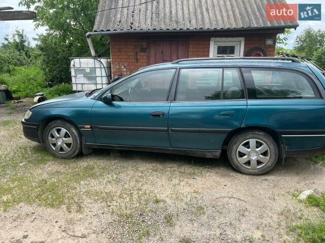 Зеленый Опель Омега, объемом двигателя 2 л и пробегом 300 тыс. км за 1450 $, фото 1 на Automoto.ua
