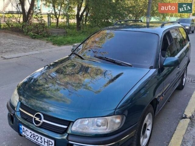 Зеленый Опель Омега, объемом двигателя 2.5 л и пробегом 270 тыс. км за 1000 $, фото 1 на Automoto.ua