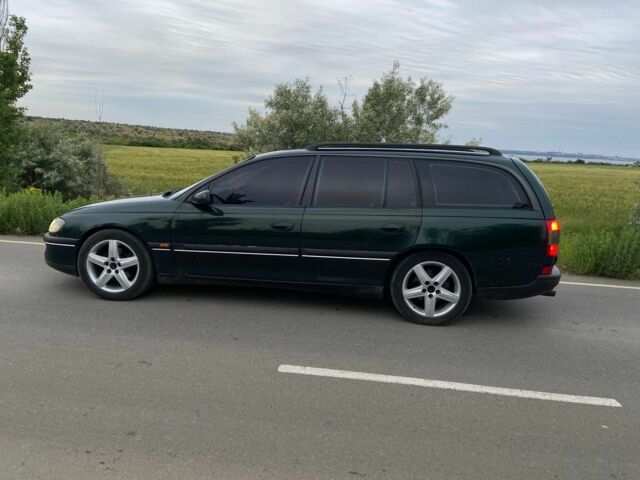Зелений Опель Омега, об'ємом двигуна 2 л та пробігом 380 тис. км за 2214 $, фото 1 на Automoto.ua