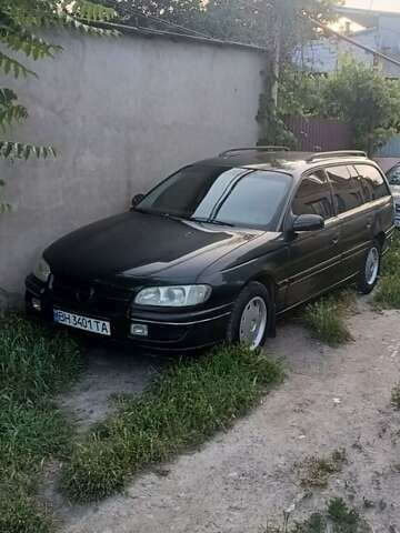 Зелений Опель Омега, об'ємом двигуна 2 л та пробігом 500 тис. км за 2700 $, фото 1 на Automoto.ua