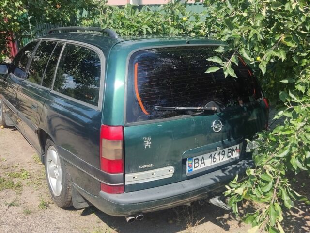 Зеленый Опель Омега, объемом двигателя 3 л и пробегом 220 тыс. км за 749 $, фото 1 на Automoto.ua