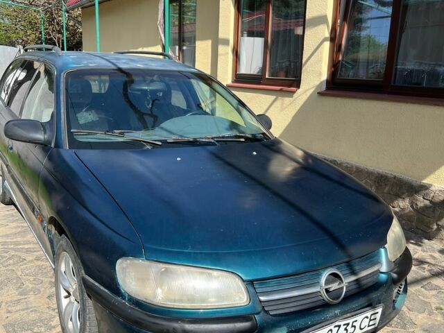 Зеленый Опель Омега, объемом двигателя 2 л и пробегом 300 тыс. км за 900 $, фото 1 на Automoto.ua