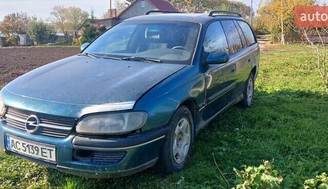 Зелений Опель Омега, об'ємом двигуна 2 л та пробігом 350 тис. км за 750 $, фото 1 на Automoto.ua