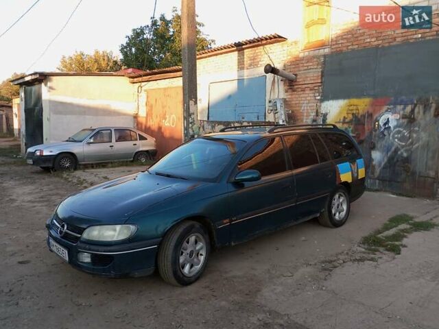 Зеленый Опель Омега, объемом двигателя 2 л и пробегом 360 тыс. км за 1500 $, фото 1 на Automoto.ua