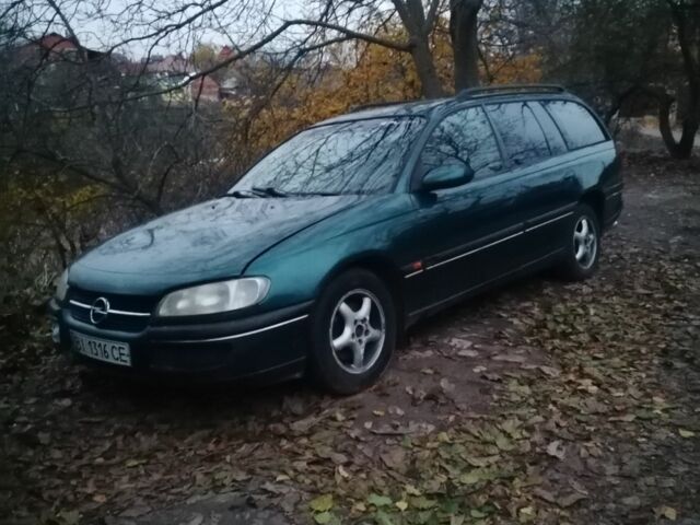 Зеленый Опель Омега, объемом двигателя 2.5 л и пробегом 204 тыс. км за 828 $, фото 1 на Automoto.ua