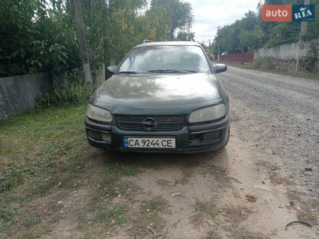Зеленый Опель Омега, объемом двигателя 2 л и пробегом 400 тыс. км за 1200 $, фото 1 на Automoto.ua