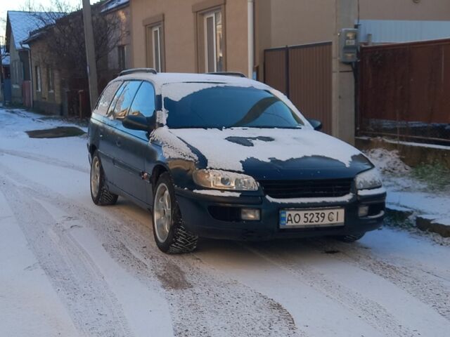 Зеленый Опель Омега, объемом двигателя 2.5 л и пробегом 380 тыс. км за 1700 $, фото 1 на Automoto.ua