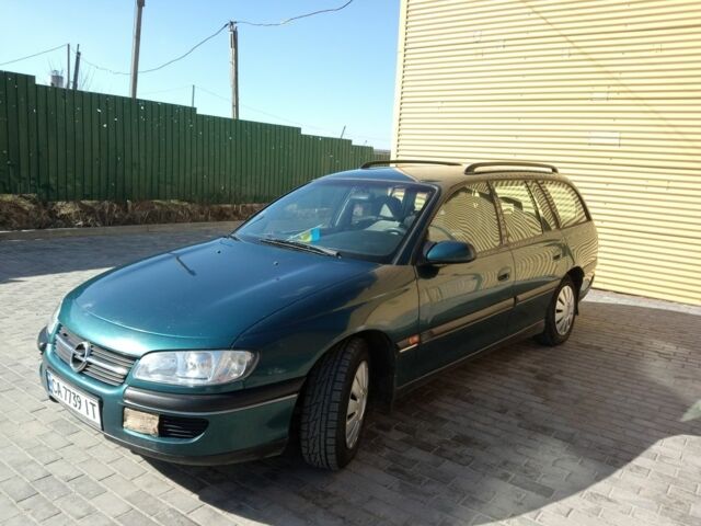 Зеленый Опель Омега, объемом двигателя 2 л и пробегом 334 тыс. км за 2700 $, фото 1 на Automoto.ua