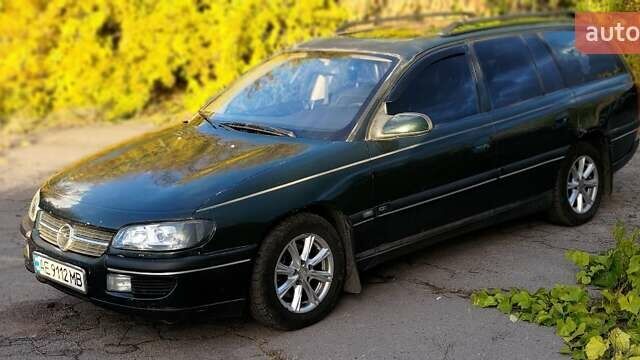 Зеленый Опель Омега, объемом двигателя 2 л и пробегом 484 тыс. км за 2000 $, фото 1 на Automoto.ua