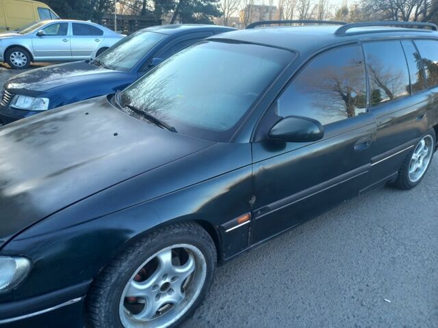 Зеленый Опель Омега, объемом двигателя 2.5 л и пробегом 380 тыс. км за 1000 $, фото 1 на Automoto.ua